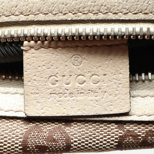 GUCCI MONOGRAM POUCH
