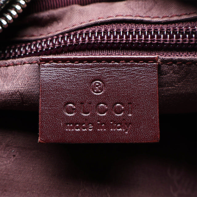 GUCCI MONOGRAM MESSENGER BAG